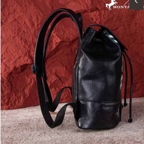 MW1245-9110 Montana West Embroidered Collection Backpack

Color black - Picture 3 of 4